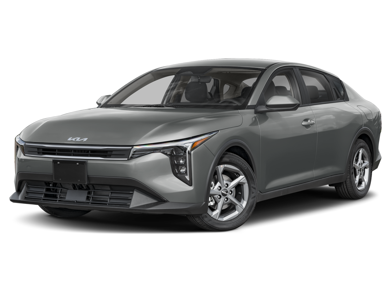 2025 Kia K4 LXS in White — front three-quarter view