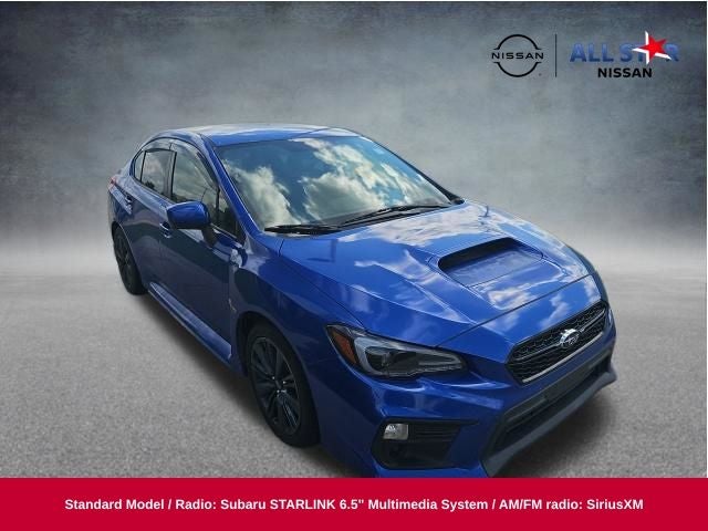 2019 Subaru WRX Base in Wr Blue Pearl — front three-quarter view