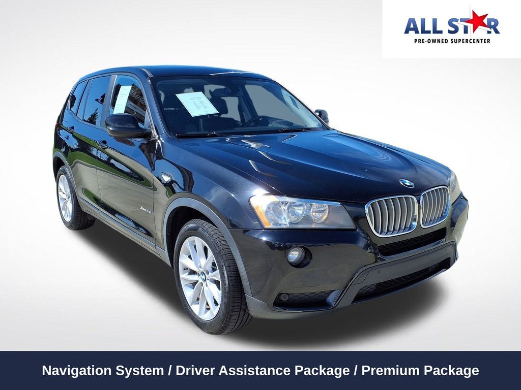 2014 BMW X3 xDrive28i in Black Sapphire Metallic — front three-quarter view