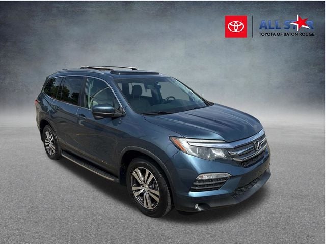 2017 Honda Pilot EX-L in Steel Sapphire Metallic — front three-quarter view